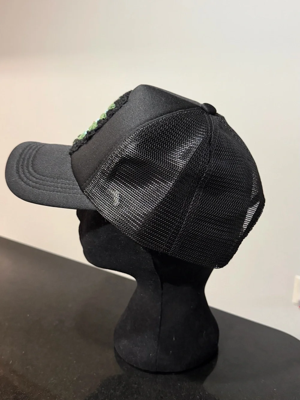 Black Truckers Hat with Crochet Granny Square.